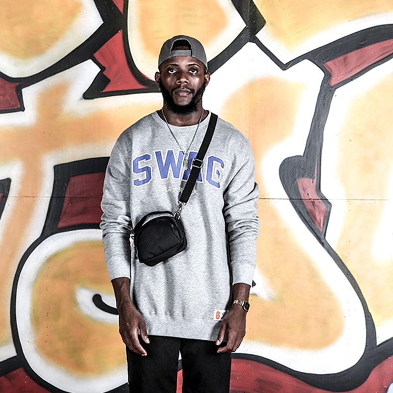 White printed swag logo on the front long sleeve sweatshirt