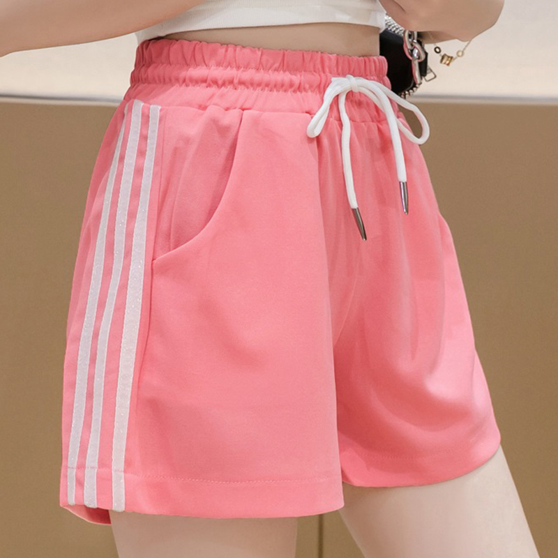 >Pink elastic striped women athletic shorts in summer