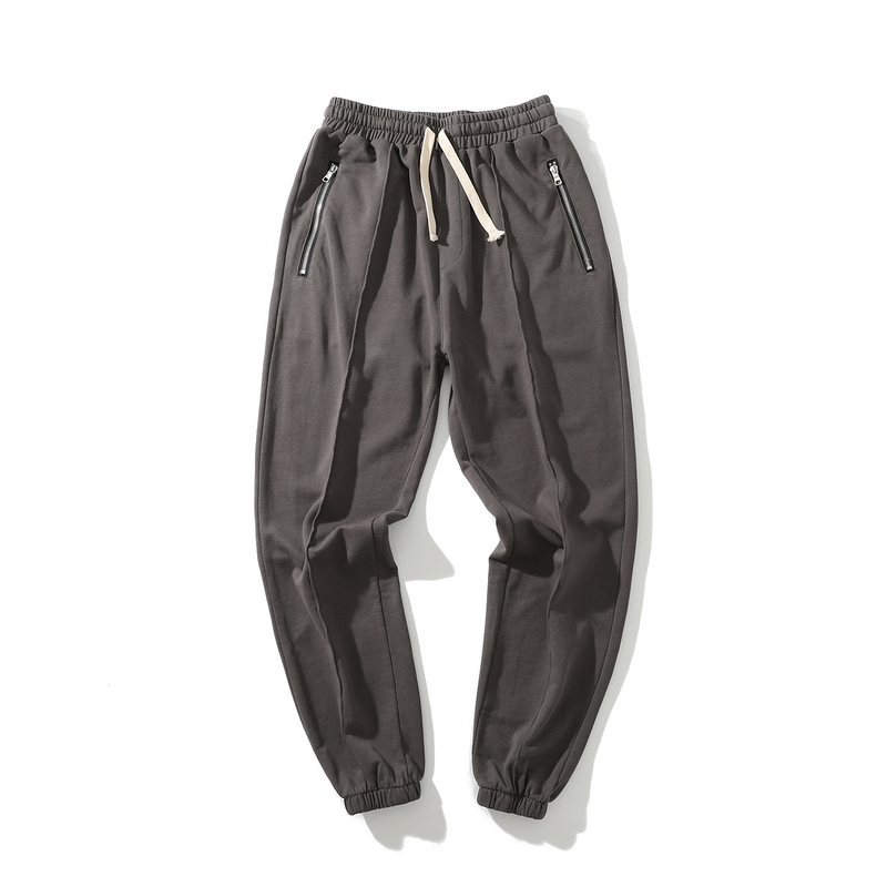 >Gray elastic casual soft loose pants with zipper pockets